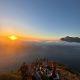 group of people watching the sunset at Chapman's peak