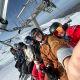 people sitting on a ski lift